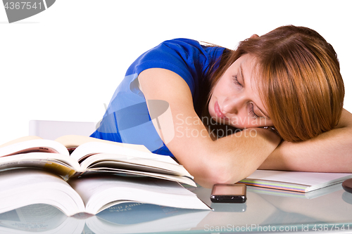 Image of College Student Sleeping on her Desk