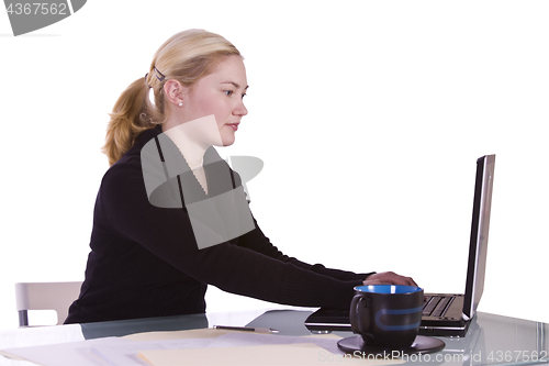 Image of Businesswoman at Her Desk Working