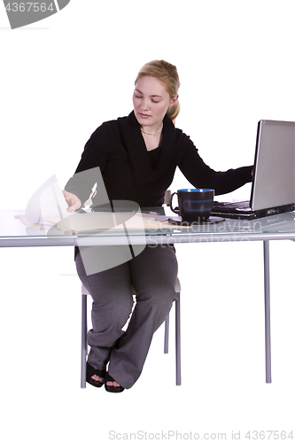 Image of Businesswoman at His Desk Working