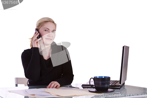 Image of Businesswoman at His Desk Working