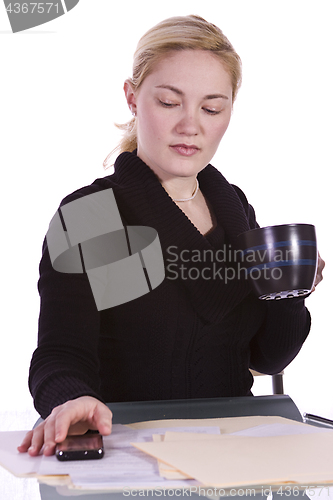 Image of Cute Woman Studying at her Desk 