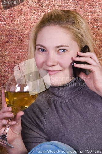 Image of Beautiful Woman Relaxing on the Couch 