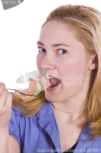 Image of Beautiful Girl Eating Salad