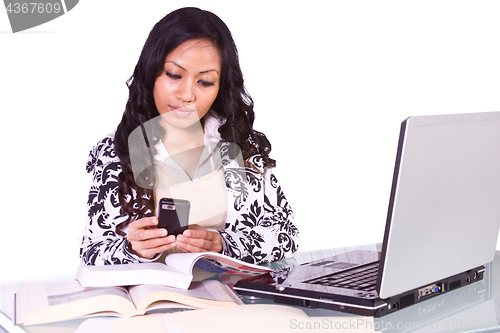 Image of Businesswoman at His Desk Working