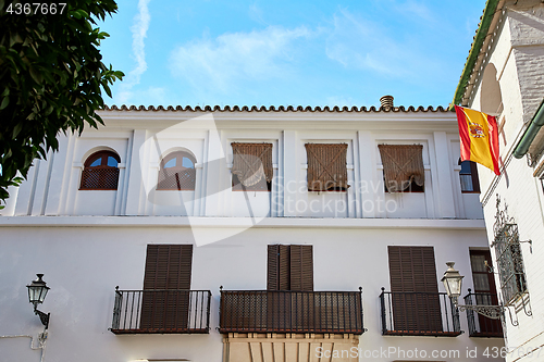 Image of The national flag of Spain hang on the balcony