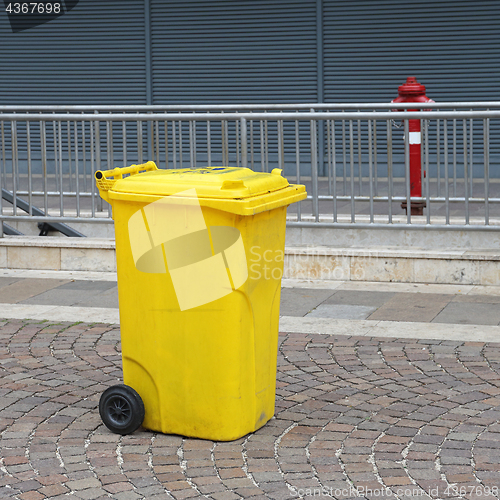 Image of Yellow Wheelie Bin