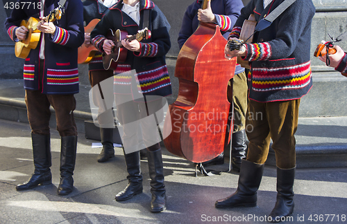 Image of Croatian tamburitza musicians in traditional Croatian folk costu