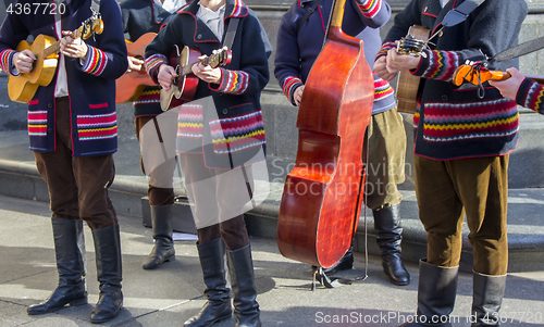 Image of Croatian tamburitza musicians in traditional Croatian folk costu