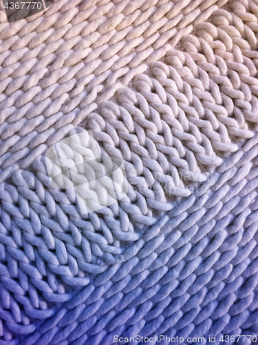 Image of White and blue handmade knitted background