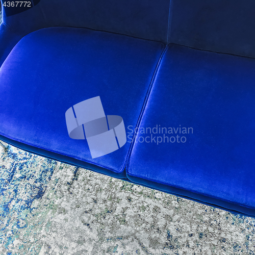 Image of Close-up of a luxurious blue velvet sofa