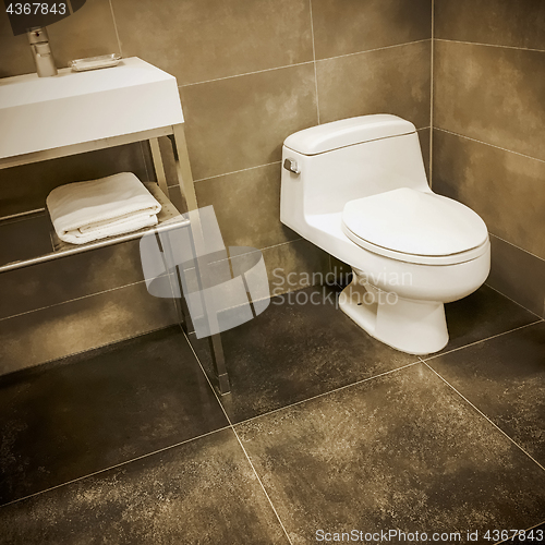 Image of Modern bathroom with sink and toilet