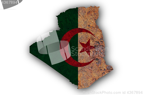 Image of Map and flag of Algeria on rusty metal