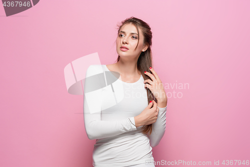 Image of The young woman\'s portrait with thoughtful emotions