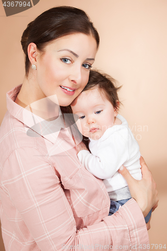 Image of mother and six months old baby girl