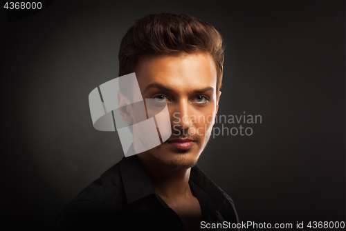 Image of Young man\'s portrait. Close-up face.