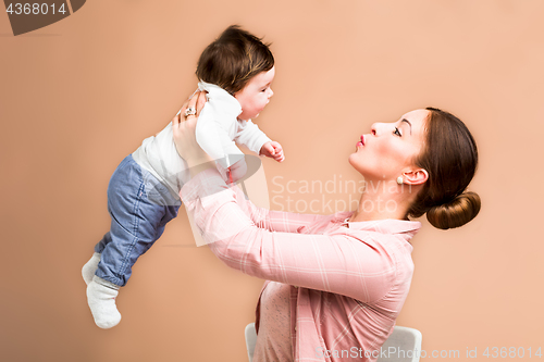 Image of mother and six months old baby girl