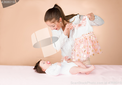Image of mother and six months old baby girl