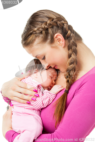 Image of Mother holding newborn baby in arms