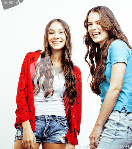 Image of best friends teenage girls together having fun, posing emotional on white background, besties happy smiling, lifestyle people concept close up