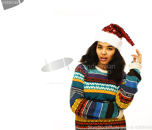 Image of cute young girl in santas red hat isolated