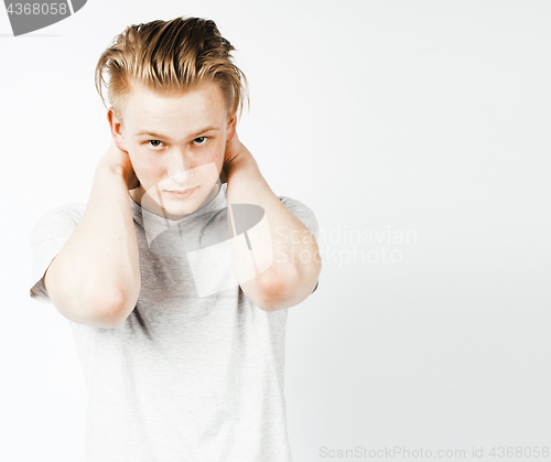 Image of young handsome teenage hipster guy posing emotional, happy smiling against white background isolated, lifestyle people concept 