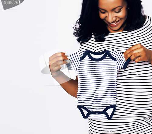 Image of pretty young african-american pregnant woman posing isolated on white background, lifestyle people concept