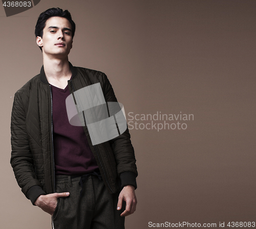 Image of handsome fashion looking man posing in studio, lifestyle modern people concept copyspace