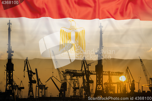 Image of Industrial concept with Egypt flag at sunset