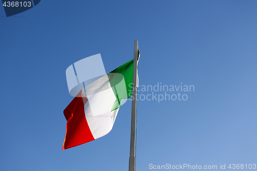 Image of National flag of Italy on a flagpole