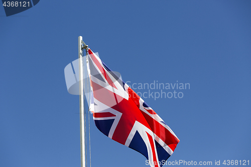 Image of UK flag on a flagpole