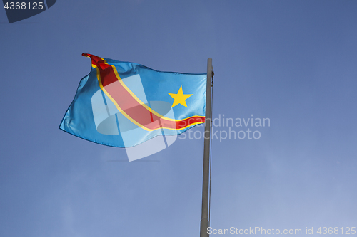 Image of National flag of Congo on a flagpole