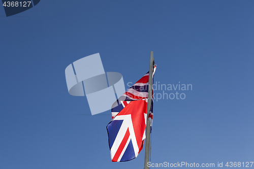 Image of UK flag on a flagpole