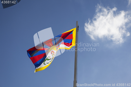 Image of National flag of Tibet on a flagpole