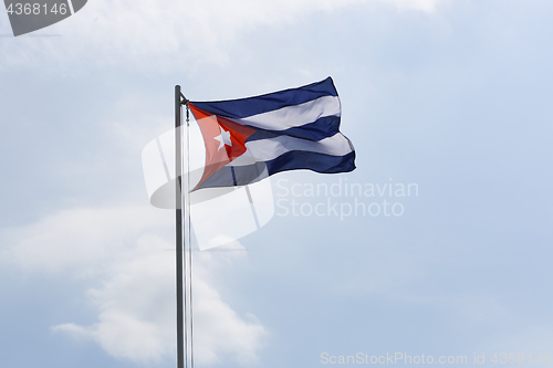 Image of National flag of Cuba on a flagpole