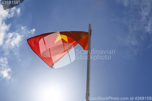 Image of National flag of Vietnam on a flagpole