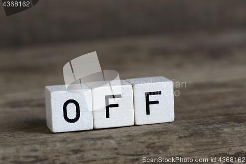 Image of Off, written in cubes