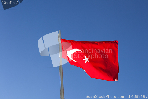 Image of National flag of Turkey on a flagpole