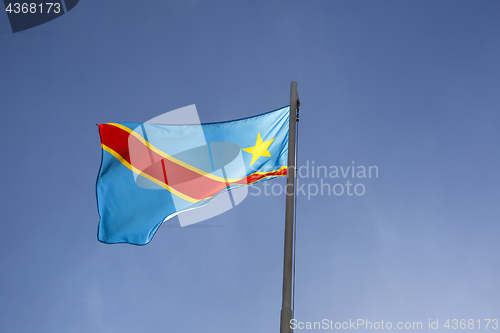 Image of National flag of Congo on a flagpole