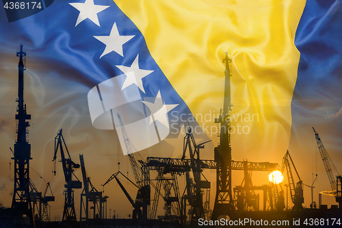 Image of Industrial concept with Bosnia and Herzegovina flag at sunset