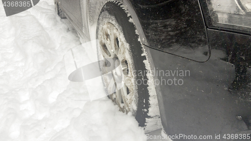 Image of Winter tires on snowy road