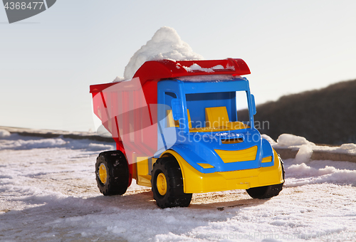 Image of toy like snow removal machine