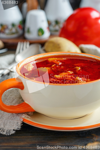 Image of Meat soup goulash in a ceramic bowl.