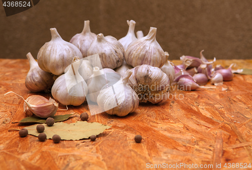 Image of garlic on wooden surface