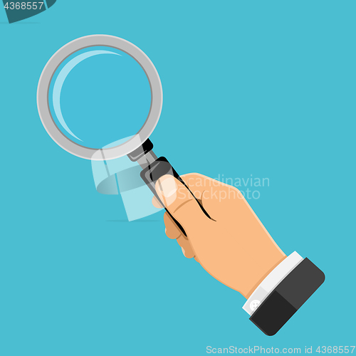 Image of Magnifying Glass in Hand