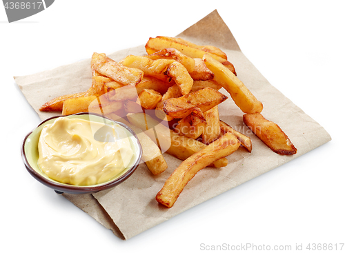Image of fried potatoes on wrapping paper
