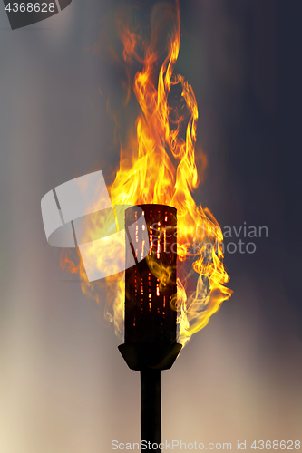 Image of burning torch at night