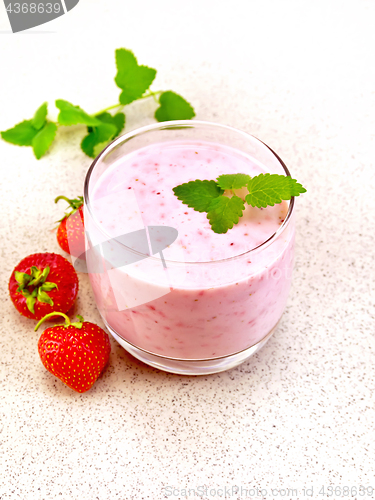 Image of Milkshake strawberry on granite table