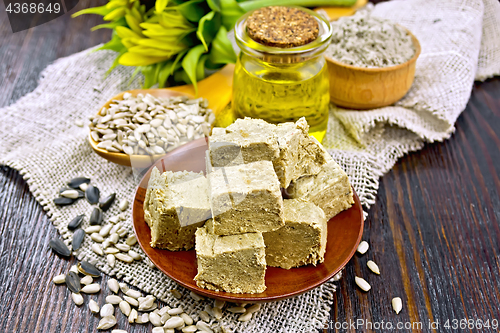 Image of Halva in plate with seeds on board