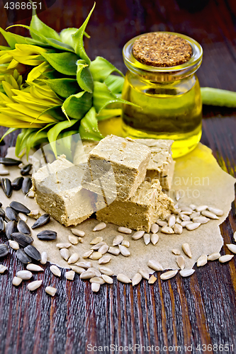 Image of Halva on paper with seeds and oil