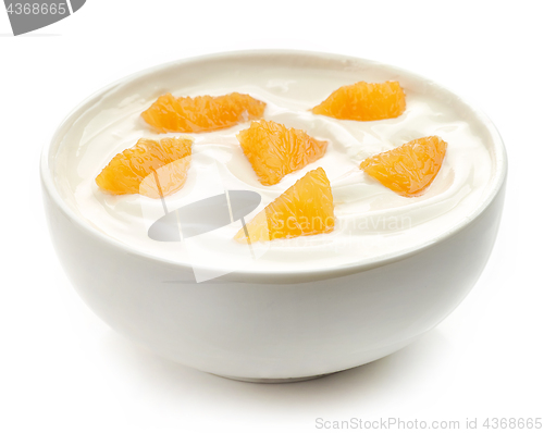 Image of bowl of yogurt with orange pieces